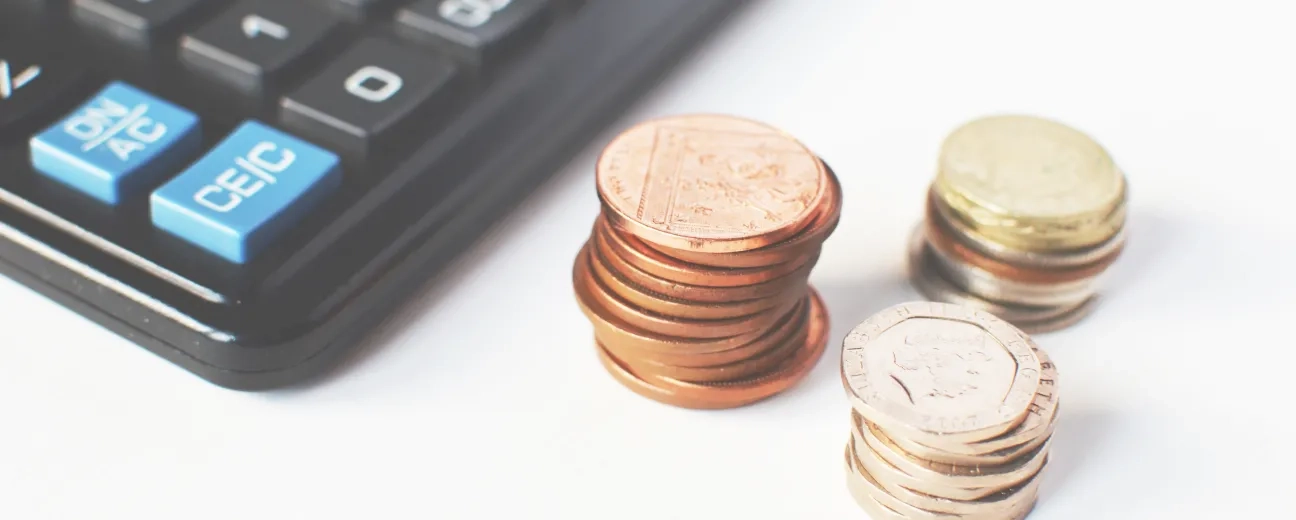 flower in pile of coins