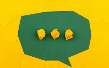 three dots on green background